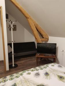 B&B / Chambres d'hotes La longere Des Glycines : photos des chambres