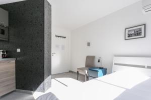 Appartements Coeur Urbain Apartments - Place de la Comedie : photos des chambres
