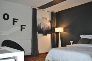 Appart'hotels Au Coeur du Jardin : photos des chambres