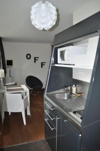 Appart'hotels Au Coeur du Jardin : photos des chambres