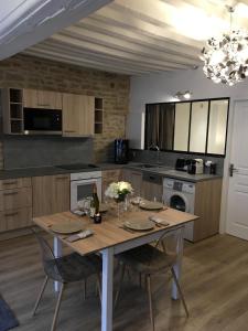 Appartements Le Petit Faubourg : photos des chambres