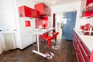 Appartements Le Sixieme Ciel : photos des chambres