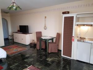 Appartements Kanzel Residences : photos des chambres