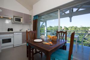 Appart'hotels Madame Vacances Residence Du Golf : photos des chambres