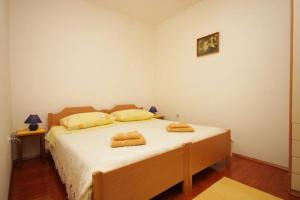 Two-Bedroom Apartment with Terrace and Sea View room in Apartments with a parking space Lovran Opatija - 7743