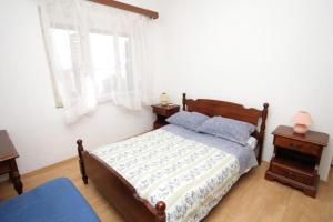 Apartments with a parking space Savar Dugi otok 8127