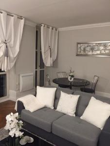 Appartements Le doux rendez-vous : photos des chambres