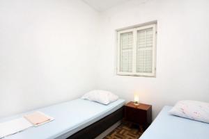 Four-Bedroom Holiday Home room in Seaside holiday house Prozurska Luka Mljet - 4946