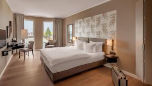 Deluxe Double Room without Balcony Garden View room in Hotel Villa Toskana