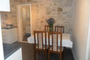 Two-Bedroom Apartment room in Apartments with WiFi Omis - 4642