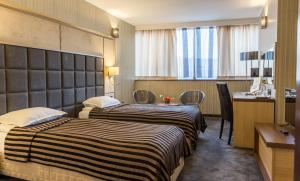 Twin Room room in Cosmopolitan Hotel & Wellness