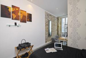 Appartements Crypto Prestige - Gare et Centre - Studio et T3 : photos des chambres