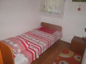 Two-Bedroom Apartment with Balcony room in Apartments with a parking space Kastel Stafilic Kastela - 11006