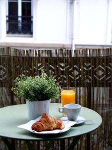 Appartements Appartement lumineux avec balcon au coeur de Paris : photos des chambres