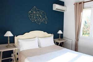 Hotels Hotel Les Oliviers : Chambre Double Supérieure - Vue sur Jardin