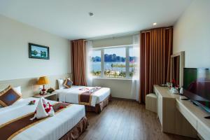 Phòng Deluxe (2 Người lớn + 1 Trẻ em) (Deluxe Room (2 Adults + 1 Child))