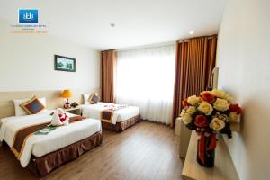 Phòng Deluxe (2 Người lớn + 1 Trẻ em) (Deluxe Room (2 Adults + 1 Child))