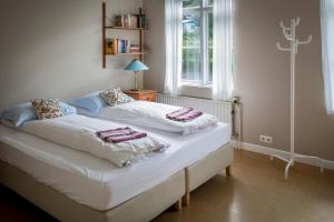 Family Room (4 Adults) room in Hafaldan HI Hostel - Old Hospital Building