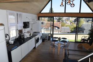 Maisons de vacances Maison centre ville avec parking, jardin, vue, AC, Le Point de vue de Leonard : photos des chambres