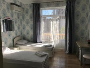 Deluxe Twin Room with Sea View room in Krasnopolyanskaya