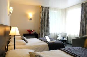 Hotels Le Manoir Hotel : photos des chambres