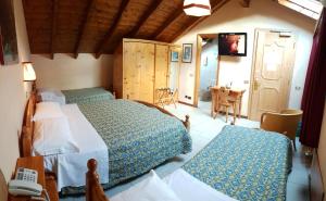 Family Room (2 Adults + 2 Children) room in Hotel Stelvio