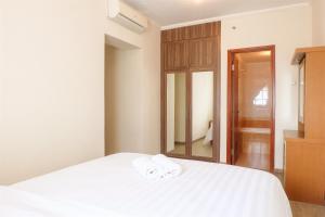 3BR Grand Palace Kemayoran Apartment For Lifestyle Living By Travelio