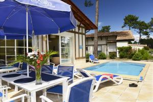 Villages vacances Residence Prestige Odalys Les Greens du Bassin : photos des chambres