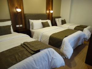 Quadruple Room room in Siena Hotel