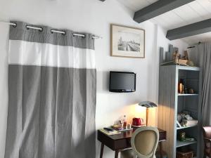 B&B / Chambres d'hotes Les Yeux Bleus Bed & Breakfast : photos des chambres