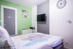 Appartements SweetHome Dijon - Zola : photos des chambres