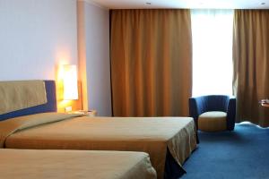 Chambre Double / Lits Jumeaux Supérieure avec Balcon - Vue sur Mer