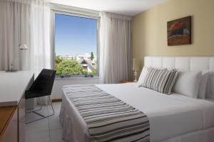 Real Colonia Hotel & Suites