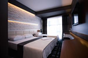 Comfort Triple Room room in Aripsas Hotel