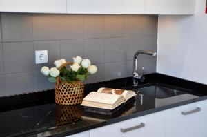 Confluentia H&A - Believe It or Not Apartments