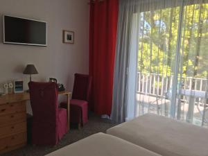 Hotels Cajarc Blue Hotel : photos des chambres