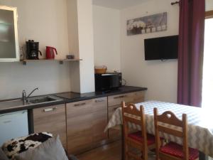 Appartements Montgenevre Neige et Golf coquet studio 4 pers maxi : photos des chambres