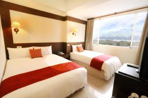 Phòng Tiêu Chuẩn Cho 3 Người Cho 2 Người Lớn Và 1 Trẻ Em (Standard Triple Room for 2 Adults and 1 Child)