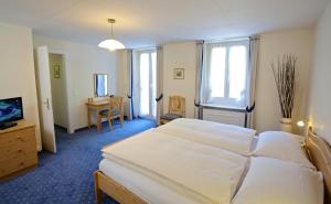 Quadruple Room room in Hôtel du Cerf
