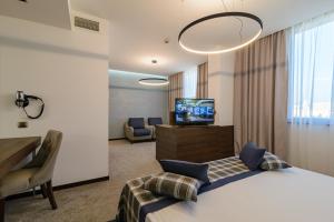 Junior Suite with Side Sea View room in Rosslyn Dimyat Hotel Varna