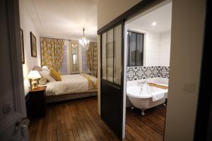 B&B / Chambres d'hotes Au Jeu de Paume : photos des chambres