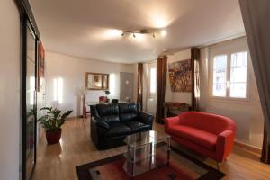 Appartements Le Petit Morny : photos des chambres