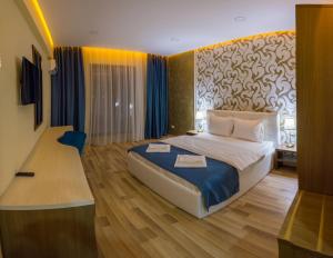 Deluxe Double Room with Balcony room in Monopoly Hotel