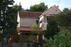 Apartments by the sea Milna Brac 2962