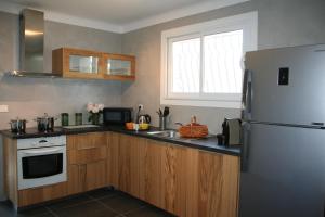 Appartements Maison Loubiere : photos des chambres