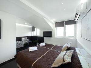 Deluxe Double Room (2 Adults + 1 Child) room in Agent Lux Apartments