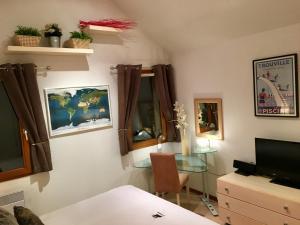 Appartements Les Ecureuils Squirrel Lodge : photos des chambres