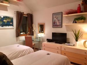 Appartements Les Ecureuils Squirrel Lodge : photos des chambres