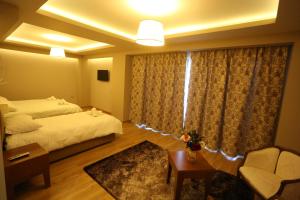 Family Room with Balcony room in Perla Hotel