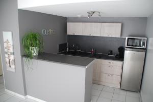 Appartements Comme a la maison : photos des chambres